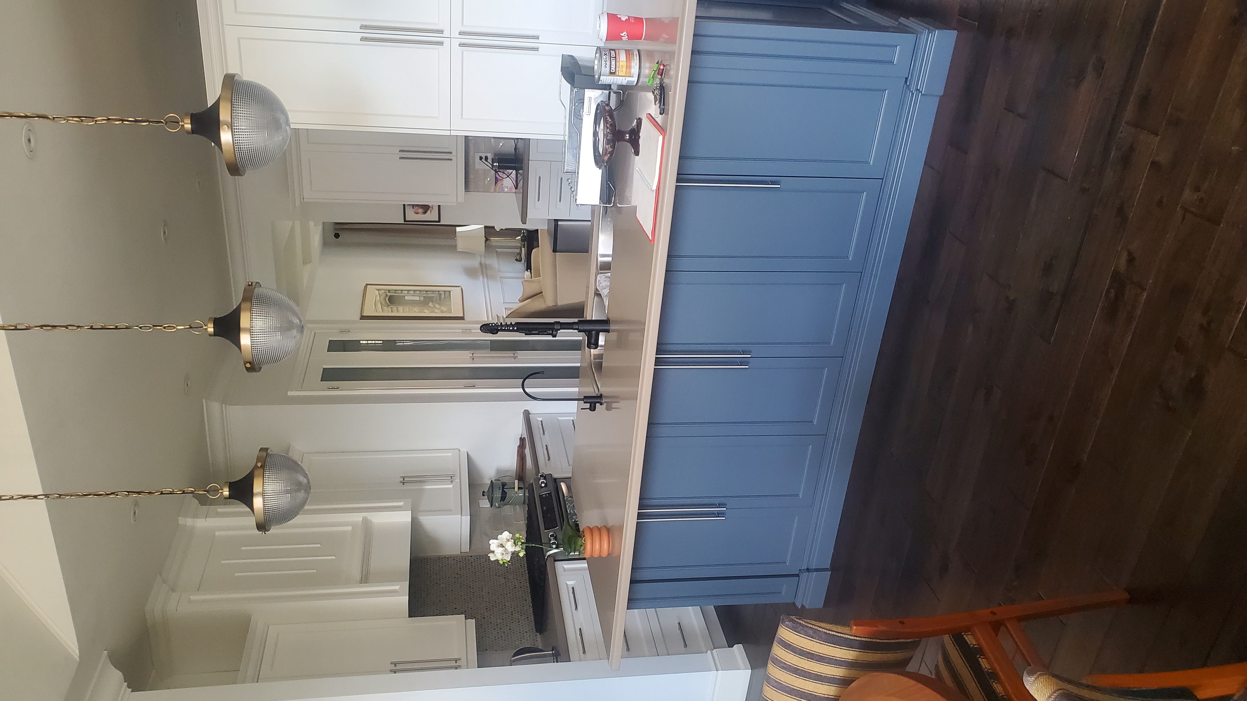 Professionally painted kitchen cabinets in a modern home