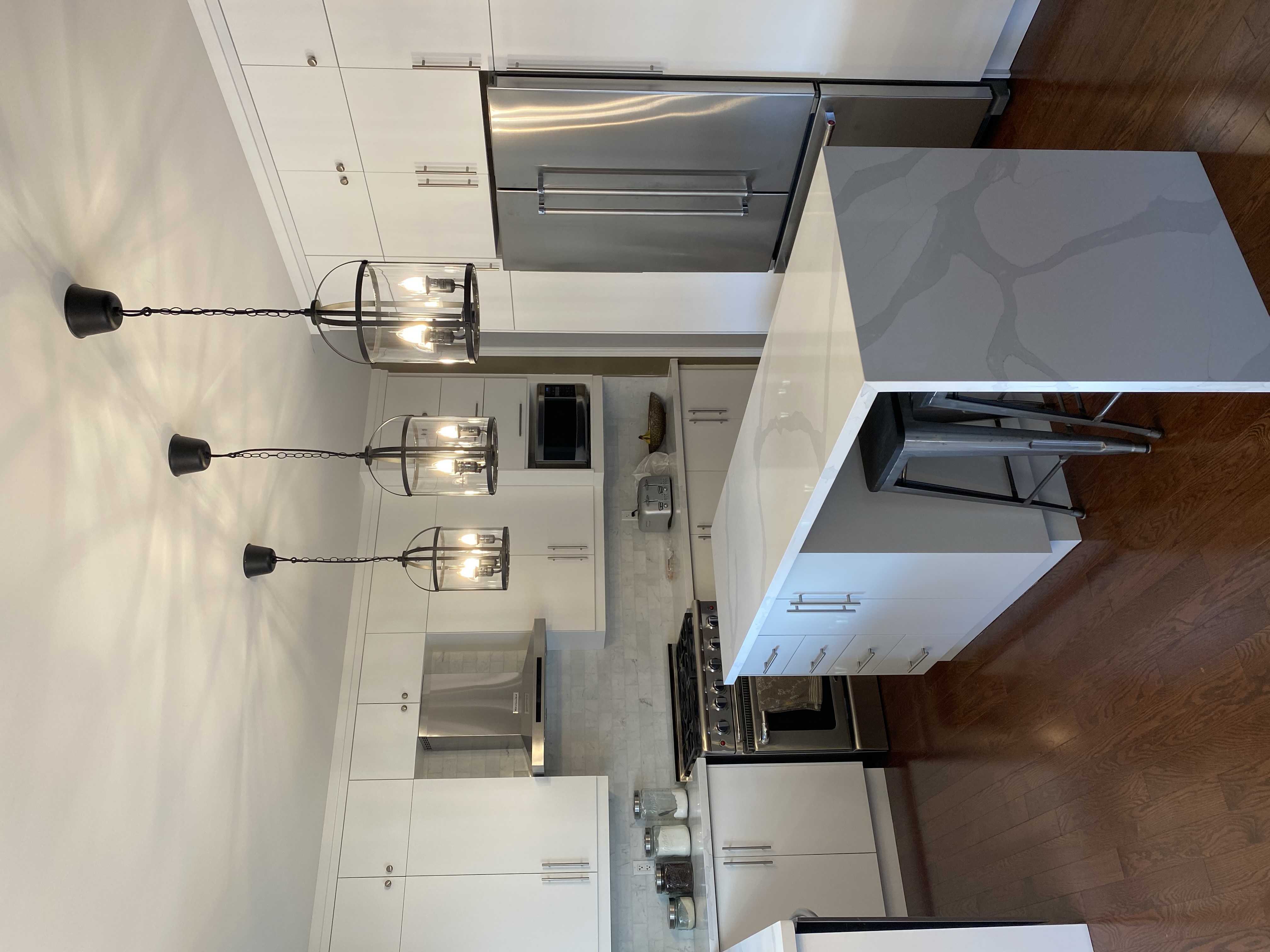 Freshly painted kitchen cabinets with professional lacquer finish